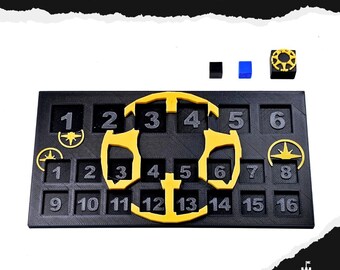 May include: A black MCP Tracker board with yellow and white accents. The board has numbered squares from 1 to 16, with a large yellow design in the center. Includes black and blue dice and a yellow and black die. The text "MCP TRACKER" is at the top.