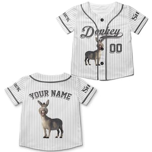 May include: White baseball jersey with vertical pinstripes and gray accents. The front features the word "Donkey" in a stylized font, a cartoon donkey graphic, and the number "00". The back has the text "YOUR NAME" and another donkey graphic.