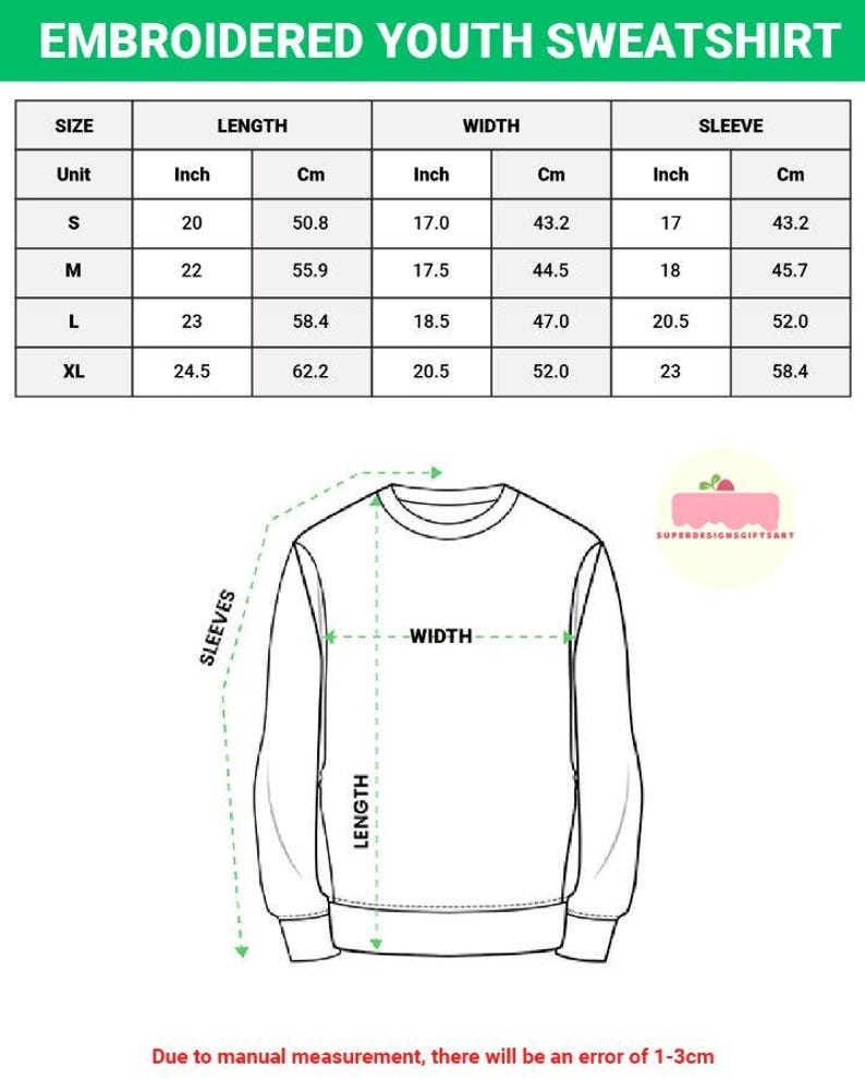 May include: Diagram showing measurements for an embroidered youth sweatshirt, including length, width, and sleeve dimensions in inches and cm. Sizes are S to XL. The text at the top reads "EMBROIDERED YOUTH SWEATSHIRT".