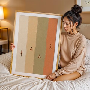 May include: A framed vertical wall art print featuring four distinct vertical color panels in shades of cream, beige, sage green, and terracotta. Small, minimalist figures are depicted in various yoga poses across the textured background.