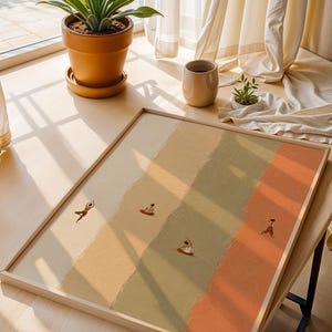 May include: A rectangular framed wall art print featuring four vertical color-blocked sections in cream, yellow, sage green, and terracotta. Small, minimalist illustrations of figures in various yoga poses are positioned within each colored panel.