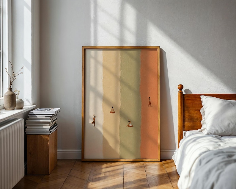 May include: A rectangular framed wall art print featuring four vertical panels in shades of cream, tan, olive green, and terracotta. The artwork depicts small, stylized figures performing various yoga poses across the textured color segments.