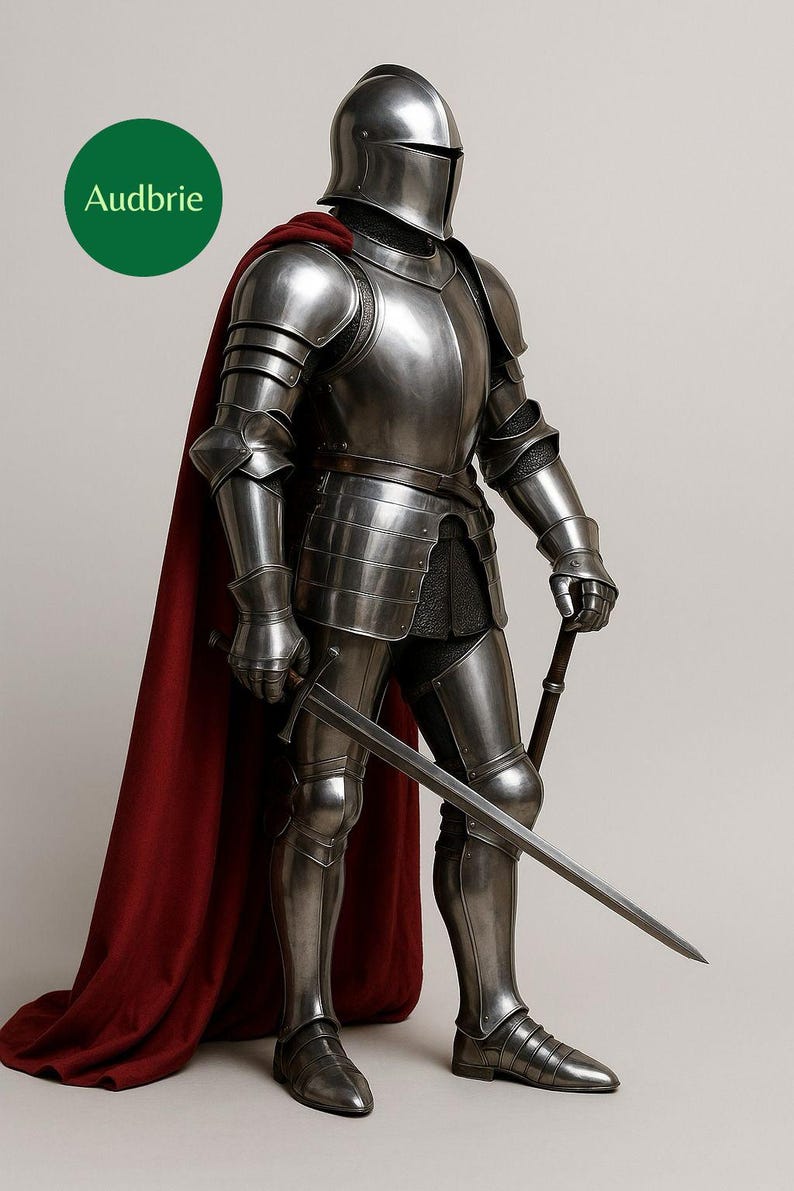 May include: A full suit of medieval armour in polished steel, including a helmet, shoulder guards, and leg protection. A red cape drapes over the shoulders. The knight holds a sword in one hand and a smaller weapon in the other.
