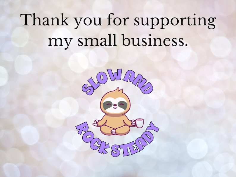 May include: Image with text that reads "Thank you for supporting my small business." A cartoon sloth in a yoga pose holds a mug, surrounded by the words "SLOW AND ROCK STEADY" in a purple bubble font. The background is a soft bokeh.