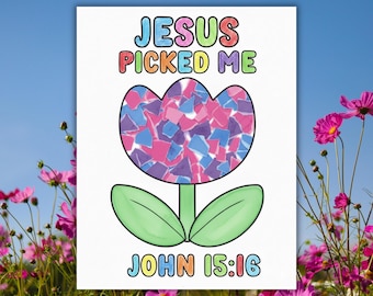 May include: A white poster featuring a flower illustration with the text "JESUS PICKED ME" and "JOHN 15:16". The flower petals are filled with pink, blue, and purple paper pieces. The background shows a blue sky and pink flowers.