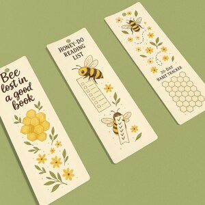 Puede incluir: Tres marcapáginas rectangulares con diseños de abejas. Uno de los marcapáginas dice "Bee lost in a good book" con un gráfico de panal. Otro dice "HONEY-DO READING LIST" con una abeja y una lista de verificación. El tercero dice "30-DAY HABIT TRACKER" con un panal.