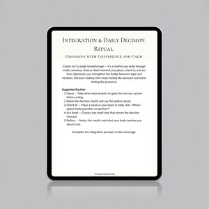 May include: A digital tablet displaying a white page with black text titled "INTEGRATION & DAILY DECISION RITUAL". The text provides guidance on making decisions with confidence and calm, including a suggested routine. The tablet has a black border.