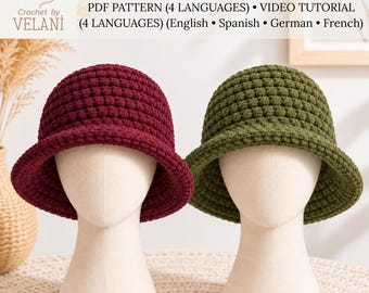 May include: Two crochet velvet bucket hats, one in deep burgundy and one in olive green, displayed on two mannequin heads. The text reads: Crochet Velvet Bucket Hat, Digital PDF Crochet Pattern, PDF PATTERN (4 LANGUAGES), VIDEO TUTORIAL.