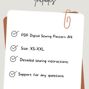 May include: A white card with the word "Includes" in cursive script. The card lists a PDF digital sewing pattern, sizes XS-XXL, detailed sewing instructions, and support for questions. A copper paperclip is attached.