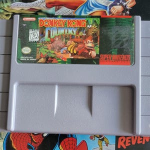Donkey Kong Country (Authentic) - SNES - Super Nintendo System NTSC Cartridge + Plastic Sleeve
