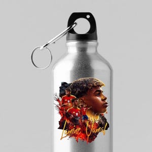 May include: A silver water bottle with a black cap and a silver carabiner clip. The bottle features a colourful graphic of a footballer with the name "Lamine Yamal" in gold script.