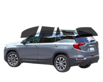 Peut inclure: Un SUV gris avec des vitres teintées, vue latérale. Le véhicule a des roues noires et une plaque d'immatriculation arrière. Les vitres sont teintées en noir, sur fond blanc.