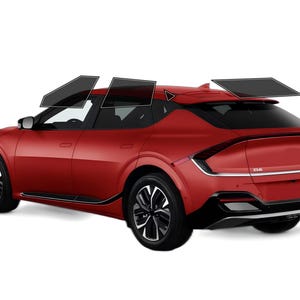 May include: A red Kia EV6 electric SUV with black wheels and tinted windows. The vehicle is shown from a rear three-quarter view against a white background. The car has a sleek, modern design.