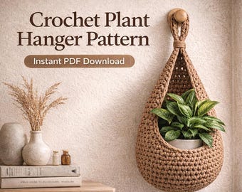 May include: A brown crochet plant hanger with a plant inside, suspended from a wall. The plant hanger is teardrop-shaped. Text at the top reads "Crochet Plant Hanger Pattern" and "Instant PDF Download".