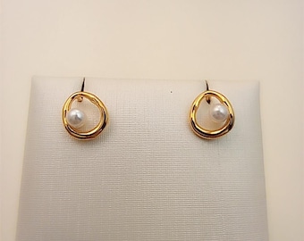 cultured pearl stud earrings pandora organically shaped oval & treated freshwater