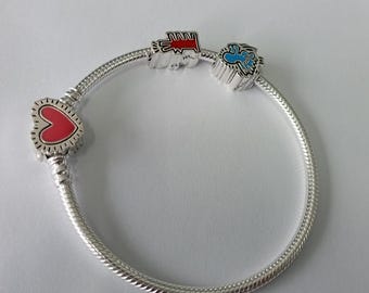 bracelet set pandora moments keith haring charms and radiant heart snake chain