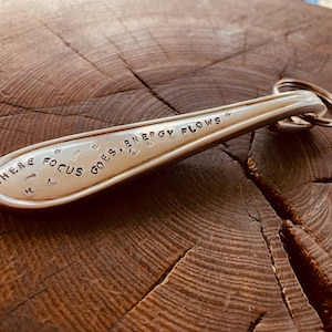 Vintage stamped keyring - Where focus goes, energy flows, hand stamped, gift under 10, gift wrapped, positive quote, up cycled, re-purposed