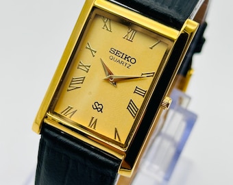 Vintage Seiko Slim Tank-stijl quartz herenpolshorloge, rechthoekig horloge, gouden wijzerplaat