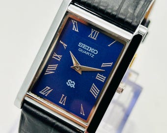 Reloj vintage Seiko Slim Tank de cuarzo con esfera azul rectangular para hombre