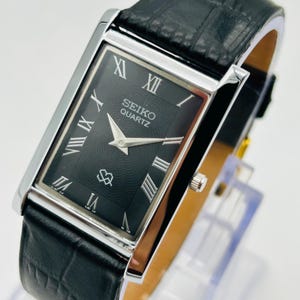 Vintage Seiko Slim Tank-klocka – svart urtavla, minimalistisk 90-talsklocka