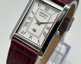 Reloj de pulsera vintage Seiko Slim Tank de cuarzo para hombre, correa de cuero y acero inoxidable, color blanco
