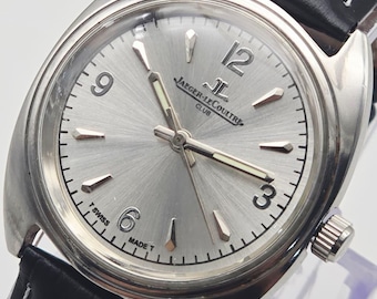 Vintage Jaeger-LeCoultre Club-klocka – tillverkad i Schweiz, med silverfärgad urtavla i solsken