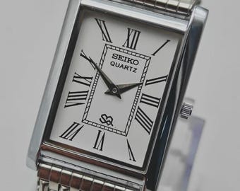 Reloj Seiko Tank vintage: esfera romana blanca, acero inoxidable