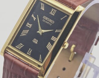 Vintage Seiko Slim Quartz Tank Watch: Gold Plated Rectangular Case, Green Roman Numeral Dial