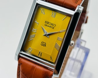 Reloj Seiko Tank vintage – Esfera amarilla con números romanos, correa de cuero