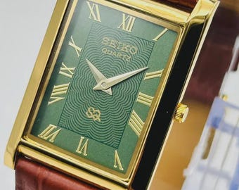 Vintage Seiko Slim Quartz Tank Watch: Gold Plated Rectangular Case, Green Roman Numeral Dial