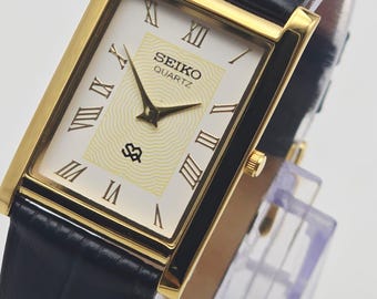 Vintage Seiko Slim Tank Quartz herenpolshorloge, rechthoekig horloge - zwart-wit horloge