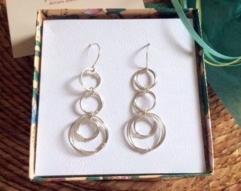 Silver Circles Drop Earrings Sterling Silver Hoop Dangles Silver Coiled Rings Earrings Open Circle Earrings Unique Modern Wire Jewelry