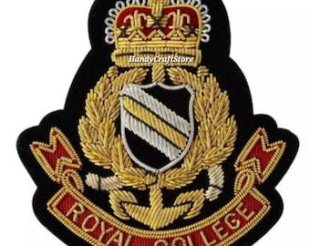 May include: A black embroidered patch with a gold crown, shield, and laurel wreath design. The patch features the text "ROYAL COLLEGE" in red and gold. The text "HandyCraftStore" is also visible.