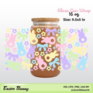 May include: A glass can wrap with a wooden lid, filled with a brown liquid. The wrap features pastel-colored Easter bunny and bow designs. The text "Glass Can Wrap 16 oz Size: 9.5x5 in" is visible. The words "Easter Bunny" are also present.