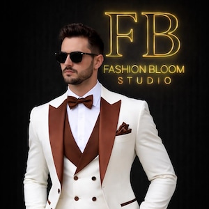 May include: A three-piece ivory suit with brown lapels, vest, and trousers. The suit features a white dress shirt, brown bow tie, and a pocket square. The image includes the text "FB FASHION BLOOM STUDIO" in a gold neon font.