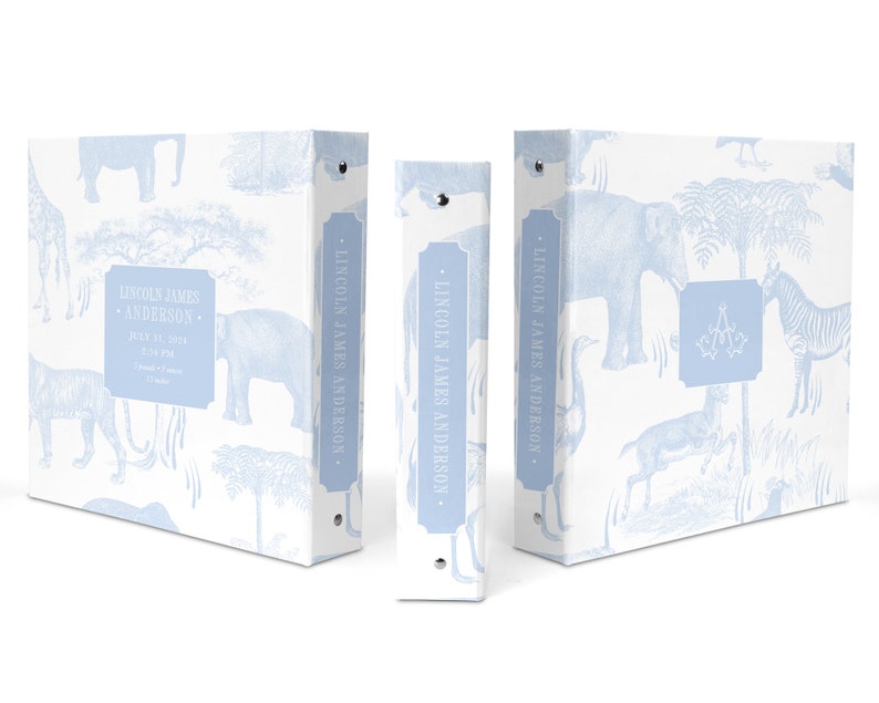 May include: Three white binders with blue accents and a light blue animal print design. The binders have a personalized name on the spine: "Lincoln James Anderson".