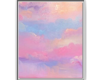May include: A framed rectangular wall art piece featuring an oil painting of a sky filled with soft, blended clouds in shades of pastel pink, lavender, peach, and light blue. The artwork is enclosed in a thin, neutral-coloured frame.
