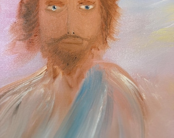May include: An oil painting on canvas depicting a person with shoulder-length wavy brown hair, a beard, and blue eyes. The figure wears a white garment draped with a blue sash. The background features soft, blended pastel tones of pink and yellow.