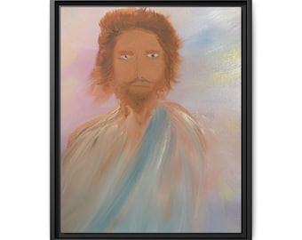 May include: A framed painting depicting a person with shoulder-length brown hair and a beard, wearing a white robe with a blue sash. The background features soft, blended pastel colours in shades of pink, yellow, and light blue, all encased in a black frame.