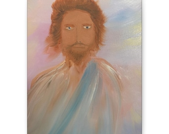 May include: A canvas painting depicting a figure with shoulder-length brown hair and a beard, wearing a white robe with a blue sash draped over one shoulder. The background features soft, blended pastel tones of pink, yellow, and light blue.