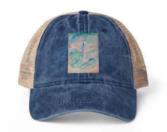 May include: A navy blue distressed trucker cap featuring a rectangular patch on the front panel. The patch displays an abstract impressionist painting with blended strokes of light blue, soft pink, green, and white colours. The cap has a mesh back.