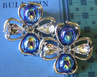 Vintage Coro Four-Leaf Clip on Earrings with Irridescent Blue Cabs and Clear Rhinestones