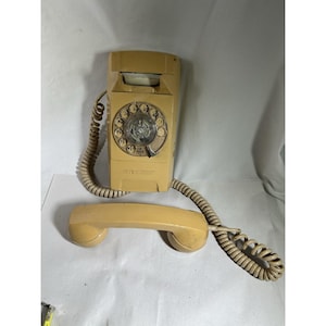 Vintage GTE Wall Mount Rotary Dial Telephone Beige Phone Collectible
