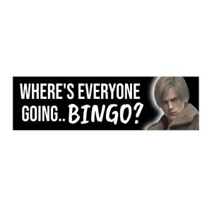 May include: A black rectangular sticker with white text that reads "WHERE'S EVERYONE GOING... BINGO?" and an image of a man with short, light brown hair. The man is wearing a brown jacket.