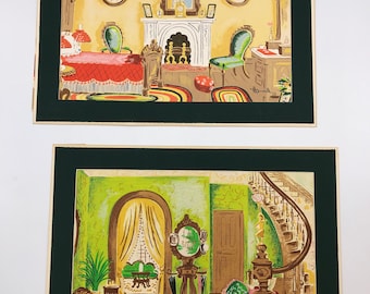 May include: Two framed vintage interior design prints. The top print depicts a yellow room with a fireplace, bed, and chairs. The bottom print shows a green room with a staircase, mirror, and furniture. Both prints have a dark green border.