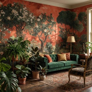 May include: A living room with a green velvet sofa, patterned armchair, and a floral mural on the wall. Potted plants and a floor lamp add to the room's decor. The rug has a traditional design.