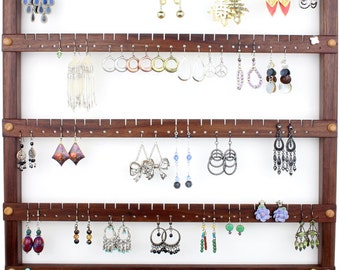 Black Walnut wall earring holder, holds 120 pair.