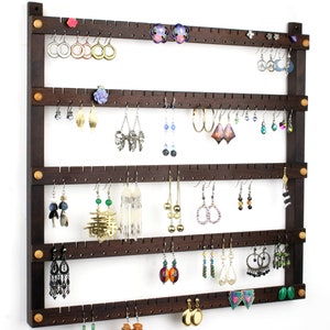 Wall Mount Earring Holder and Jewelry Organizer made from Peruvian Walnut wood. Holds up to 120 Pairs of Earrings