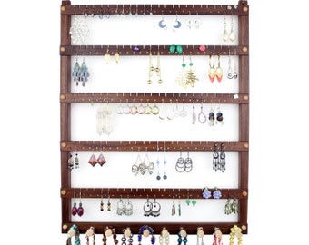 Black Walnut wall earring holder, holds 120 pair.