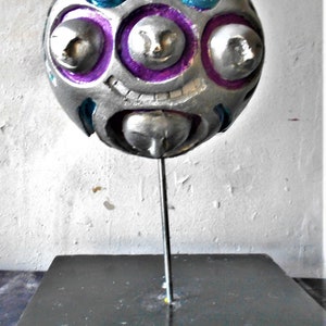 primitive meets contemporary mask sculptuure low brow psychedelic  urban art